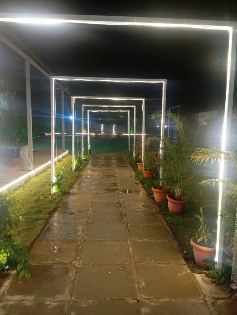 BTS Farm House Hyderabad – Beautiful Farmhouse Exterior BTS Farm House – Private Swimming Pool and Open Garden BTS Farm House – Spacious Green Outdoor Area BTS Farm House – Comfortable AC Bedroom BTS Farm House – Clean Bedroom Interior BTS Farm House – Modern Hall with Comfortable Seating BTS Farm House – Kitchen and Dining Area BTS Farm House – Private Pool for Guests BTS Farm House – Bonfire and BBQ Area BTS Farm House – Spacious Parking Area BTS Farm House – Outdoor Games and Recreation Area BTS Farm House – Peaceful Greenery Near Hyderabad BTS Farm House – Family and Friends Weekend Stay BTS Farm House – Event and Celebration Venue Near Hyderabad BTS Farm House – Farmhouse for Parties and Group Stays